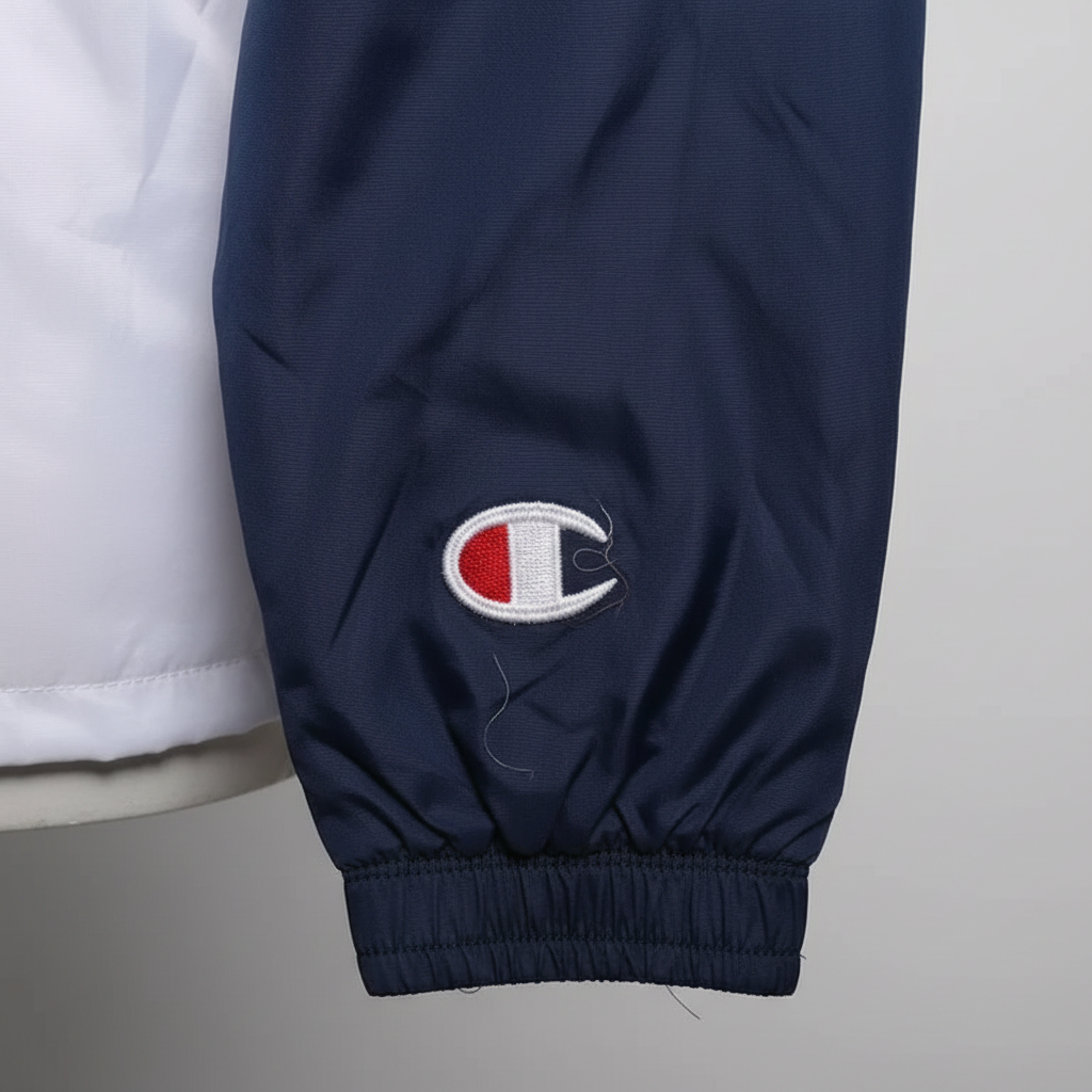 Daily Deals Outlet Champion coach jacket sleeve in navy blue with embroidered logo detail