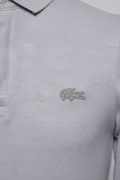 Daily Deals Outlet grey Lacoste rugby shirt featuring the iconic embroidered crocodile logo on the chest