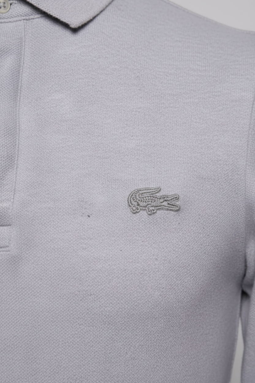 Daily Deals Outlet grey Lacoste rugby shirt featuring the iconic embroidered crocodile logo on the chest