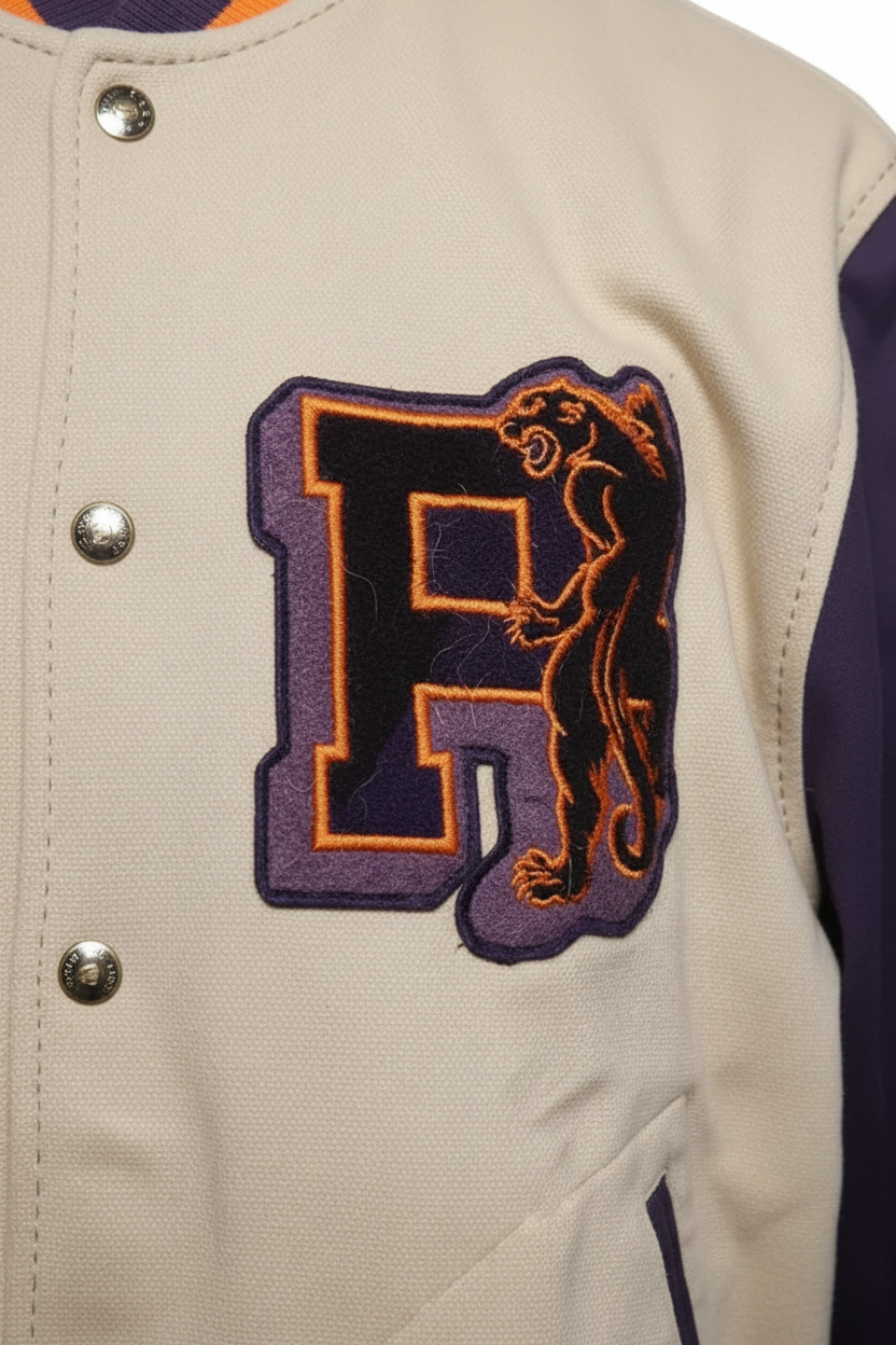 Daily Deals Outlet Puma varsity jacket in beige with purple and orange embroidered panther logo patch detail.