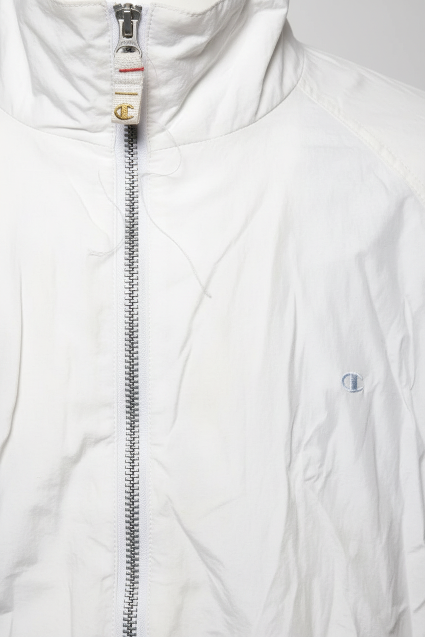 Daily Deals Outlet white Champion bomber jacket with a silver front zipper and embroidered logo detail.